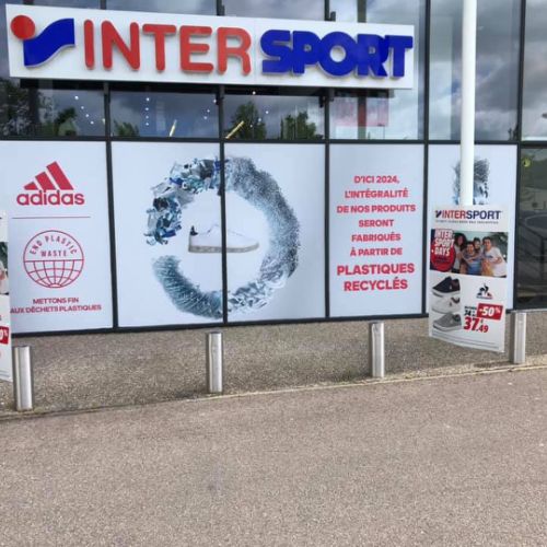 Pose microperforé sur façade magasin pour ADIDAS